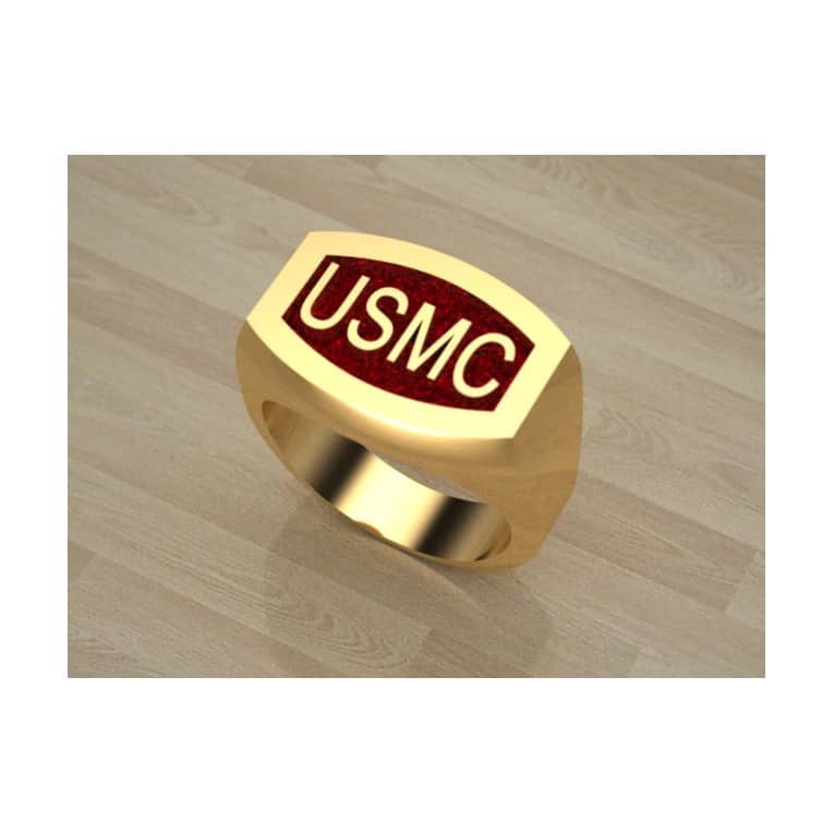 SOLID GOLD USMC RING WITH RED BACKGROUND